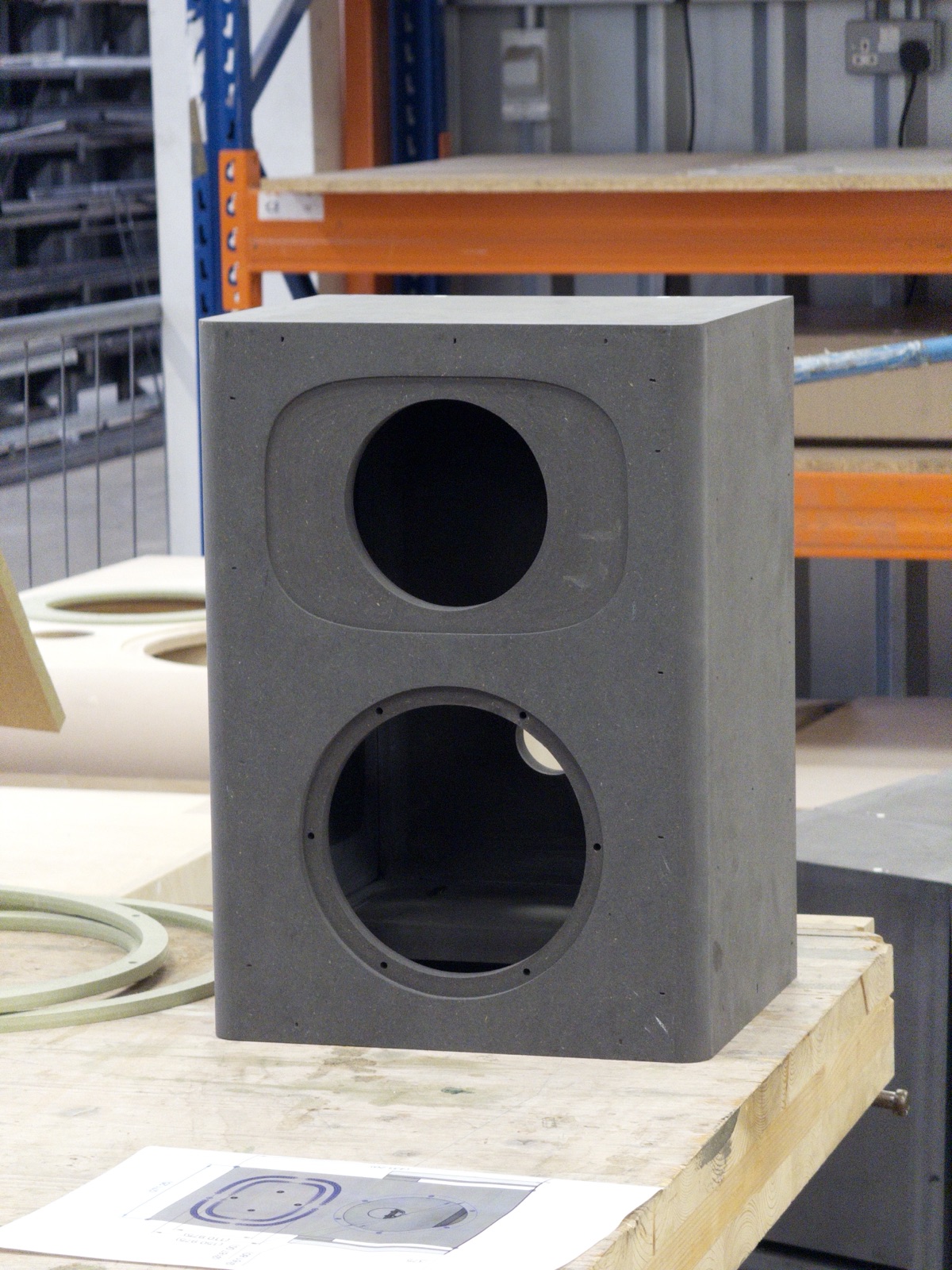 CNC-machined custom speaker enclosure with twin apertures